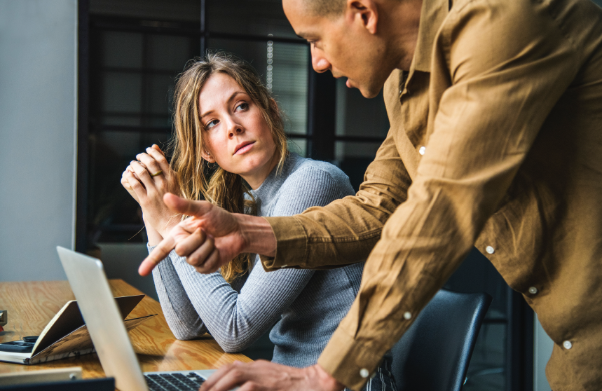 Digital Capabilities Survey Report 2019 cover; woman, man sharing idaes in front of laptop